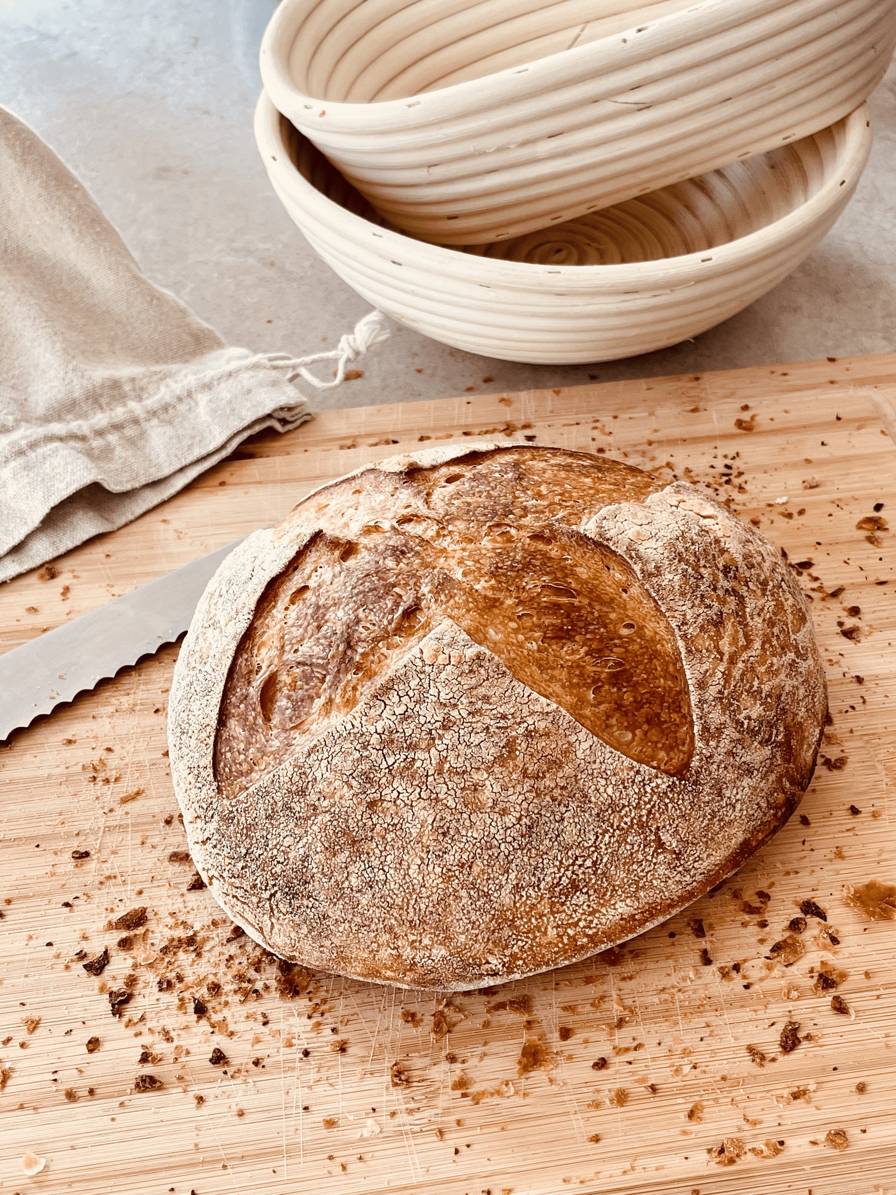 Sourdough bread loaf on chopping board